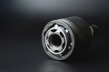 SHRUS brand new with copy space on black background. Shallow depth of field new metal detail. Background of new spare parts in selective focus