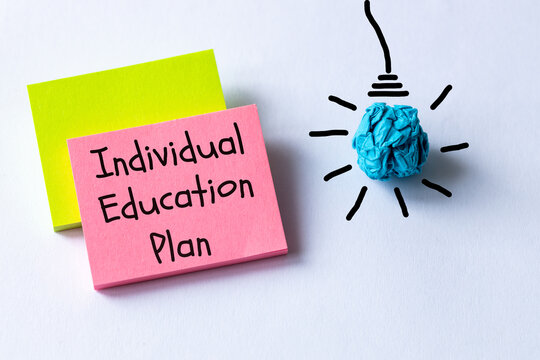 IEP Individual Education Plan symbol. IEP individual education plan word concept on colorful cards, white background. Bulb icon. The concept of an individual IEP business education plan.