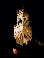 Tower detail of the Palazzo Vecchio in Piazza della Signoria in Florence at night