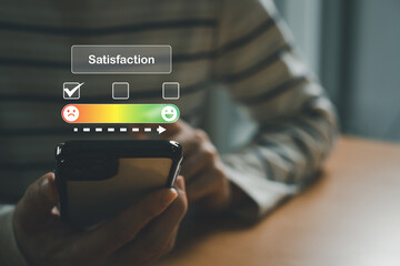Selective focus at men hand while type on smartphone to give customer satisfaction feedback for poor service quality that need meet expectation or standard of the service. Bad experience feedback.