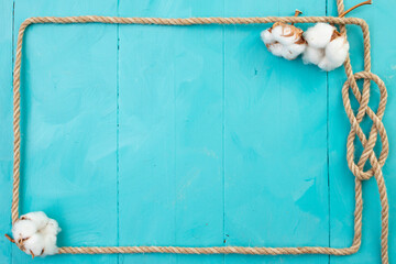 Jute rope rectangular frame, with a knot and cotton flowers