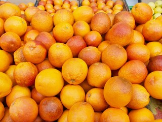 Orange fruit background in market.