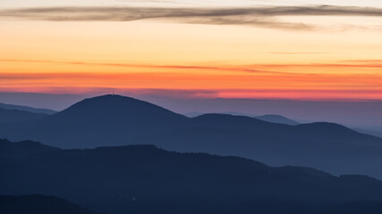 Fototapeta na wymiar Mountain layers with a dramatic sky before sunrise