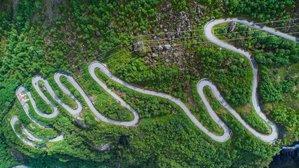 Aerial drone view of the windy road Lysevegen down to the Lysefjorden in Norway on a beautiful summer day