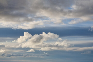 Fototapeta premium The background of the blue sky before the rain. Grey clouds.