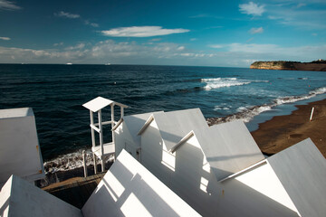 White empty beach huts on Procida island, Italy.