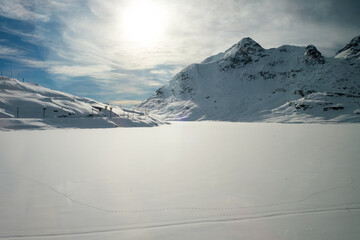 Frozen and snow covered "White Lake", Bernina Pass, Switzerland.