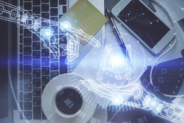 Double exposure of data drawing hologram over topview of study desk background with computer. Concept of Ai.