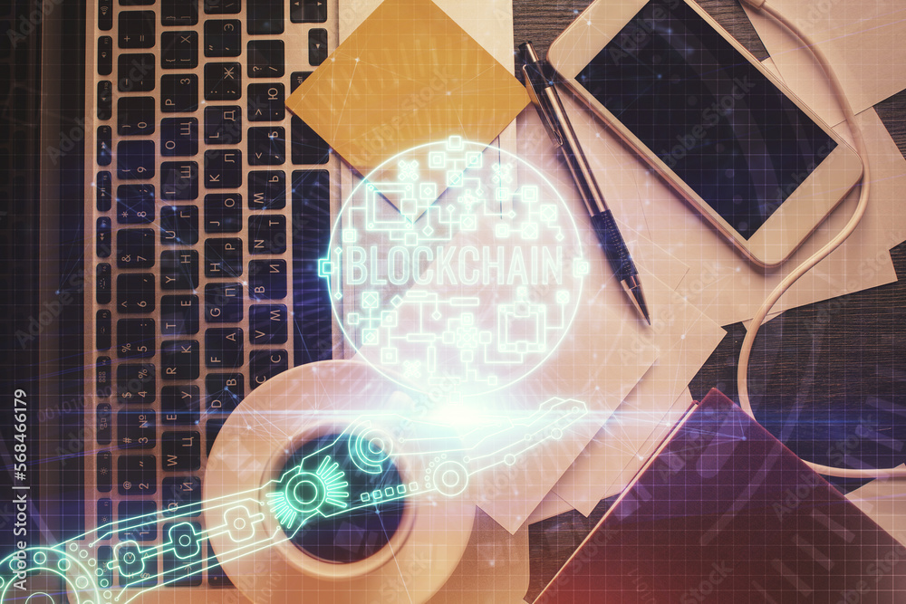 Poster Blockchain theme hologram drawings over computer on the desktop background. Top view. Multi exposure. Concept of cryptoeconomy.