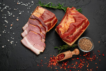Delicious artisanal whole smoked slab bacon on a cutting block. - obrazy, fototapety, plakaty
