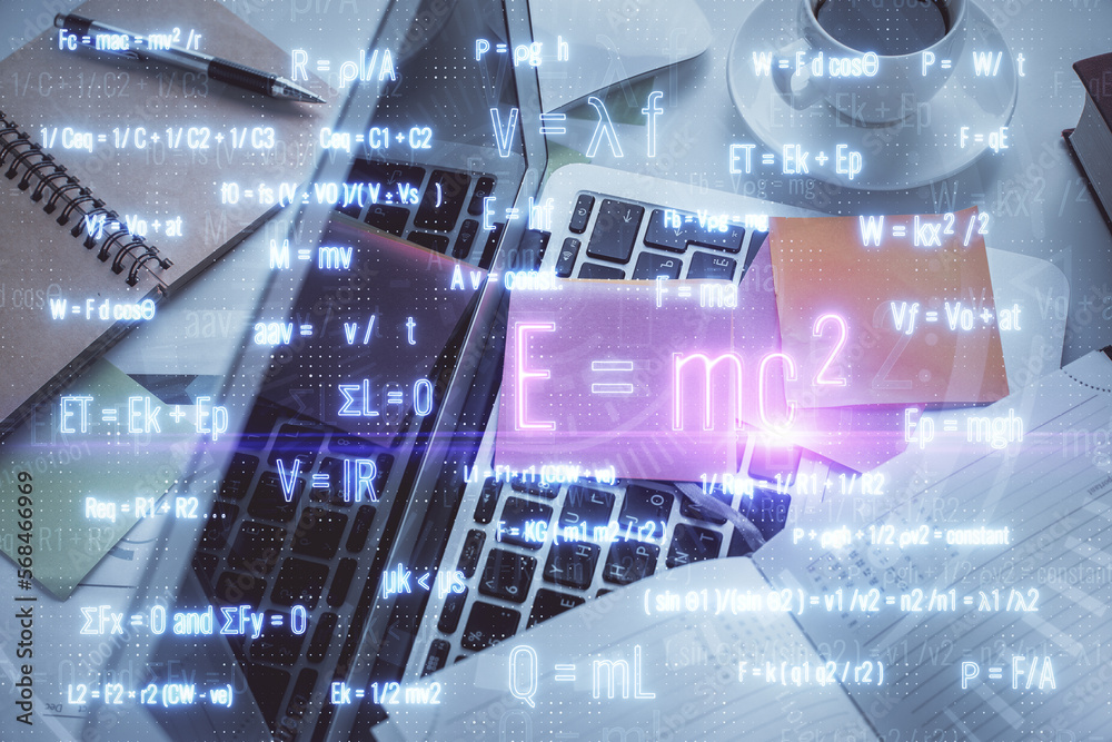 Poster Physics and math theme hologram with formula drawings over computer on the desktop background. Top view. Multi exposure. Concept of education.