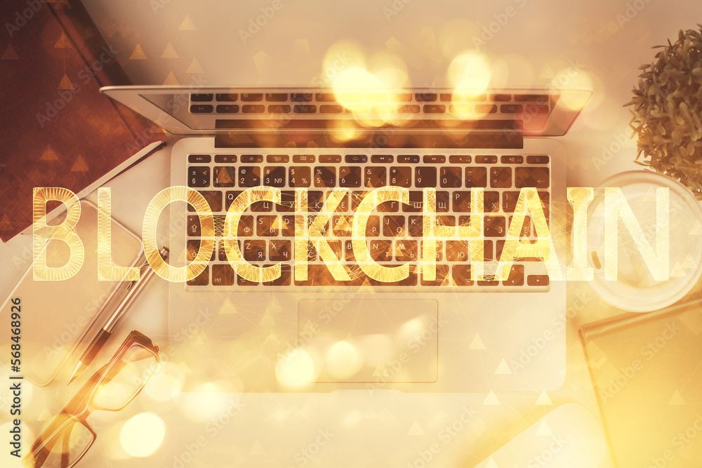 Poster blockchain theme hologram drawings over computer on the desktop background. top view. double exposur
