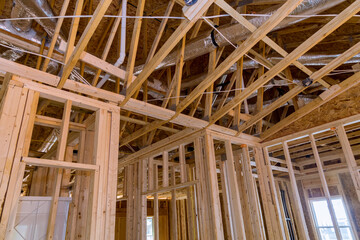 Framing beams, wood sticks all communication lines must be installed first for newly constructed house before plasterboard is applied plumbing