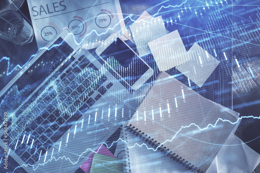 Poster financial market graph and top view computer on the desktop background. multi exposure. investment c