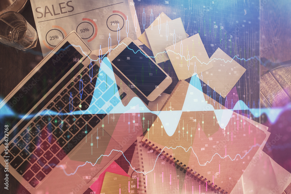 Poster Financial market graph and top view computer on the desktop background. Multi exposure. Investment concept.