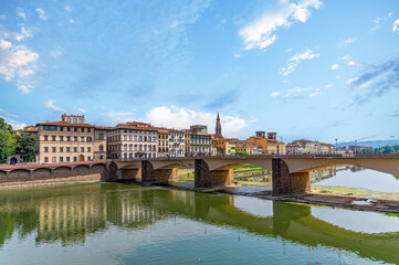 Panoramic summer view of Ponte alle Grazie with river Arno in Florence, Italy