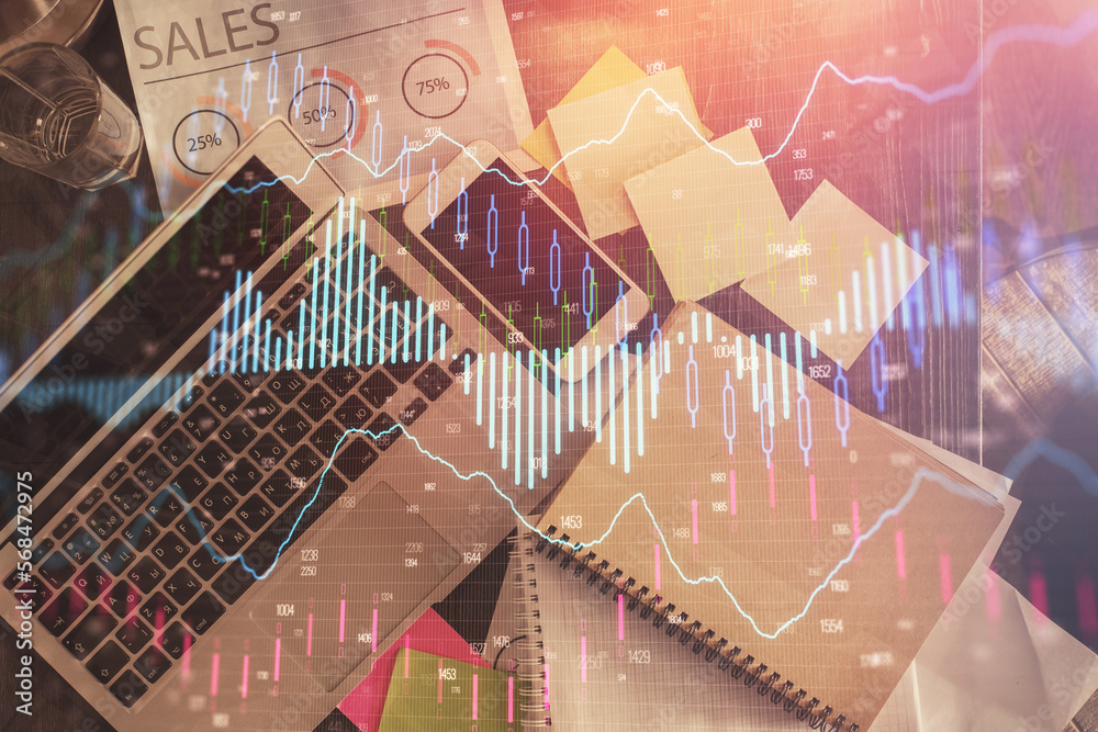 Poster financial market graph and top view computer on the desktop background. multi exposure. investment c