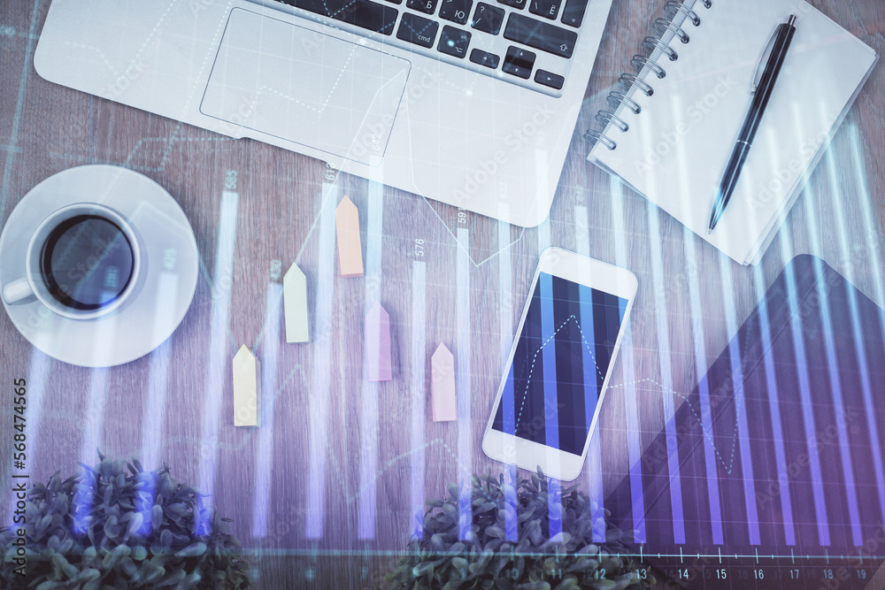 Poster double exposure of financial chart hologram over desktop with phone. top view. mobile trade platform
