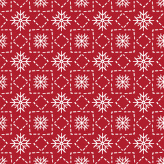 Christmas snowflake seamless pattern. Red and white background. Northern winter style. Vector illustration