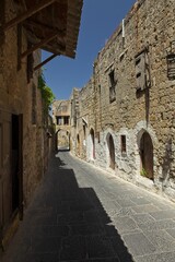 Historical street view in clear weather in spring, Old Town of Rhodes, Greece.