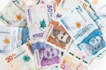 Macro closeup of Colombian pesos of different values