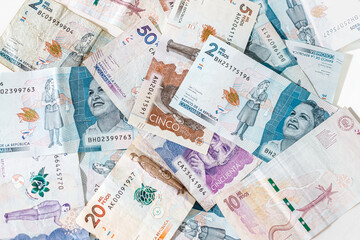 Macro closeup of Colombian pesos of different values