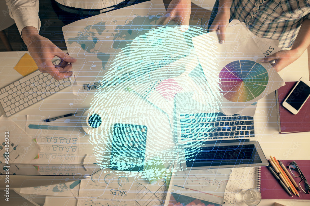Poster double exposure of man and woman working together and fingerprint drawing. computer background. top 