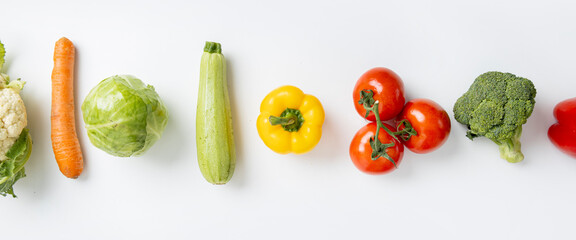 Fresh vegetables on a white background. Top view, flat lay. Banner