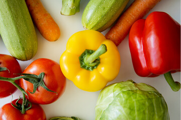 Fresh vegetables on a white background. Top view, flat lay