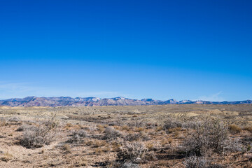 Fototapeta na wymiar Distant mountains with high desert in the foreground, western Colorado