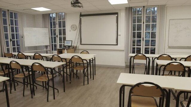 Travelling in an empty classroom with whiteboard