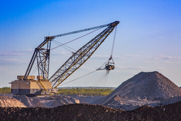 80 cubic yard bucket electric dragline.  This dragline works from an electric power cable it drags with it. 