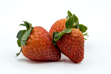 pictures of strawberries on wood with an white background