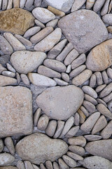 Stone wall on traditional Balinese house background texture