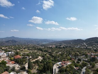 Naklejka premium Amazing view of Lefkara village in Cyprus. The view from the drone. Red roofs on the Mediterranean Sea.