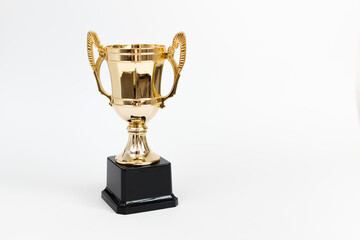 Golden Winner prize Cup on White background.