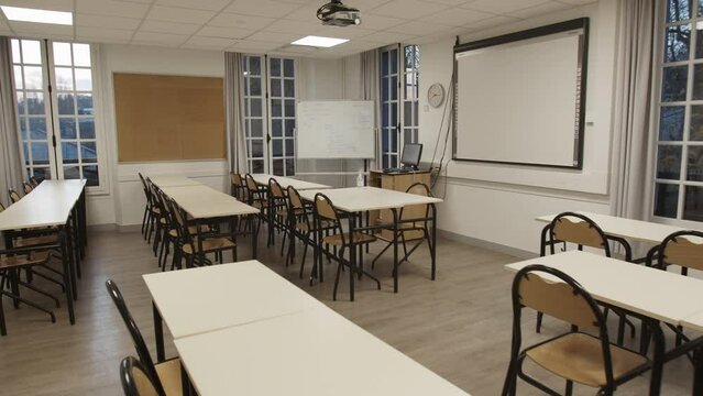 Travelling in an empty classroom with whiteboard