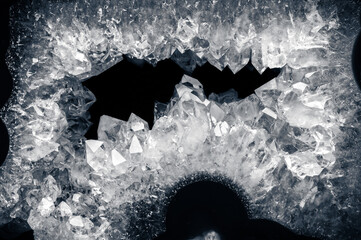 quartz geode macro detail texture background. close-up raw rough unpolished druse semi-precious...
