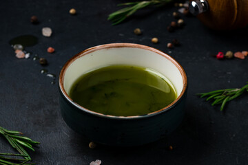 Fresh basil sauce in a small ceramic bowl.