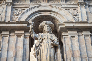 Fototapeta na wymiar Statue of the Apostle Saint James on the Cathedral in Santiago de Compostela, Spain