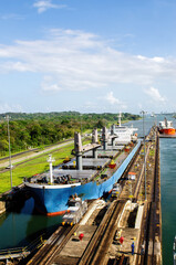 Two cargo ship transiting the Miraflores locks in the Panama Canal in Central America