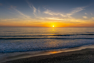 A beautiful glowing sunset in Laguna Beach, California.
