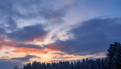 winterly sunset in the Mountains of the Bregenz forest near Sulzberg, Austria