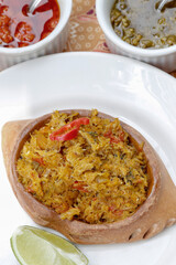 Brazilian food: crab cone or casquinha de siri in portuguese, on white dish