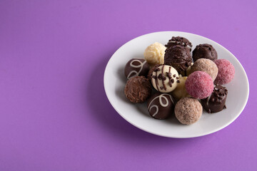 photo of chocolate-covered candy lying on a plate