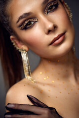 beauty bright eye makeup with arrows with rhinestones