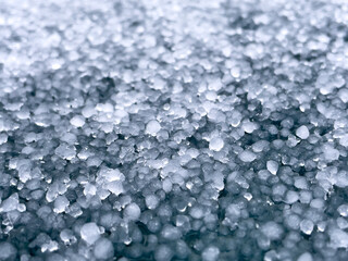 Large hailstones on a dark background. background, texture. Close-up.