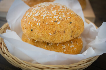 Keto buns, Low carb buns baked with psyllium husk and flax seeds in basket. Ketogenic diet and gluten free bread. Healthy eating concept, selective focus.