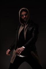 Fototapeta premium cool young man with glasses posing in a confident manner