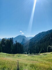 sun in the mountains